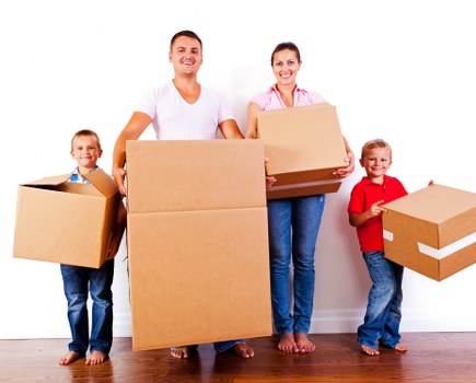 Professional house removals in Brompton with moving van and packed boxes