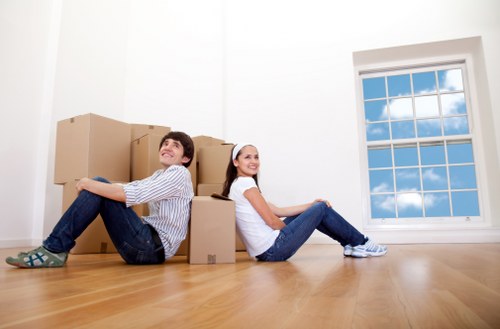 Packed boxes and furniture prepared for removals in Brompton