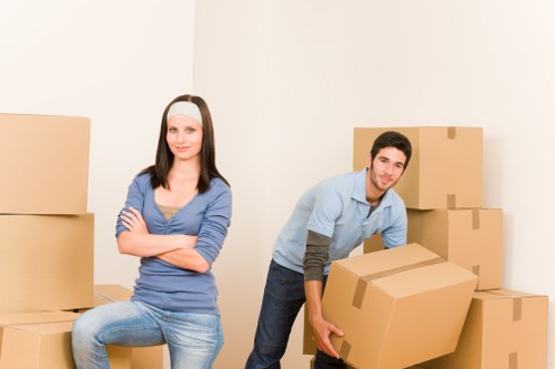 Local office movers handling furniture and files in Brompton