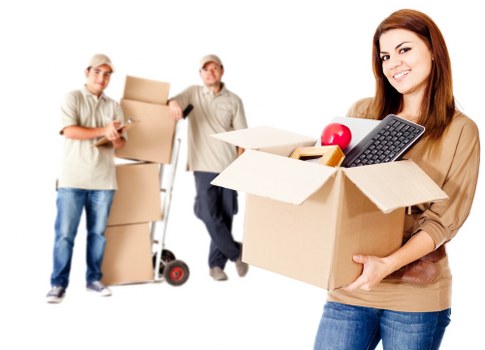 Packed office furniture and moving crates ready for Brompton relocation